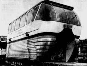 A GN freight train carries the front car of a monorail through Spokane in route to Seattle. Photo Credit: Spokane Daily Chronicle (2/17/62)